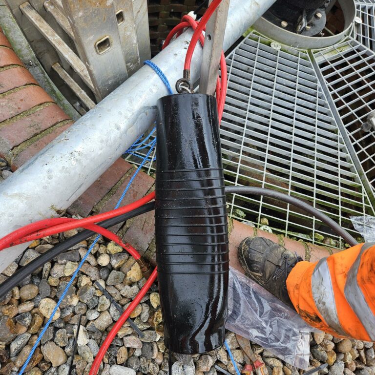 equipment being used to clear a pipe obstruction