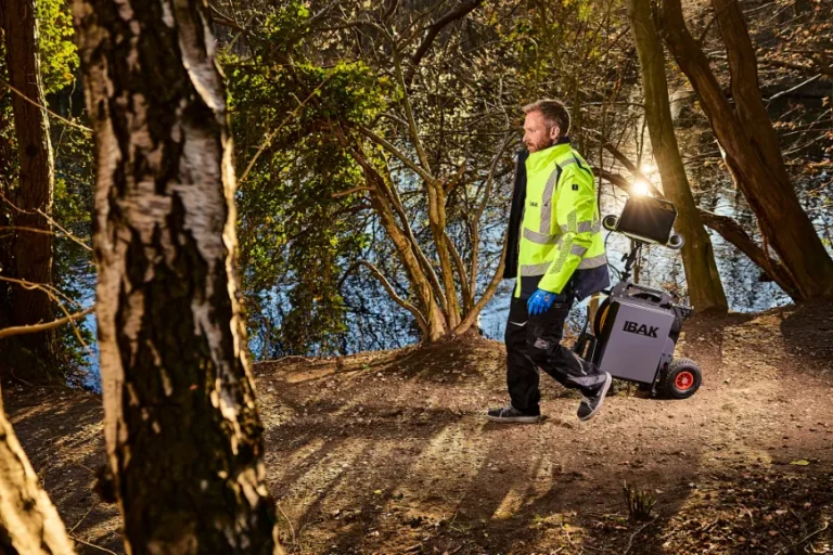 portable equipment in use in a wooded area